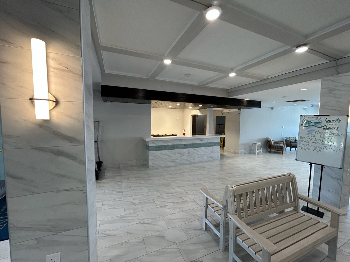 Basement remodel showing luxury flooring and new island structures